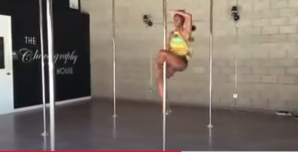 Video Of Mum Pole Dancing With Baby Strapped To Her Back Sparks Online Backlash