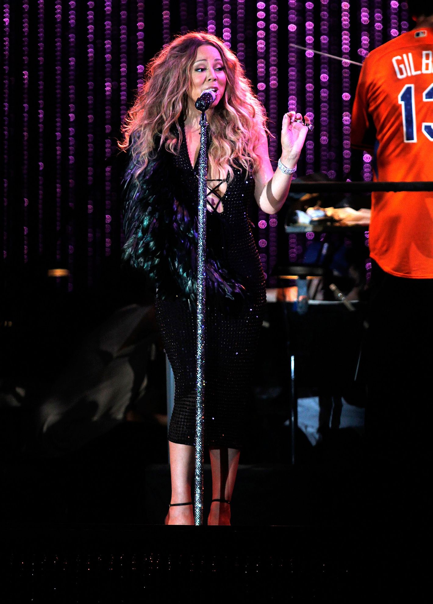 The Show Must Go On: Mariah Carey's Glamorous Arm Sling At Concert