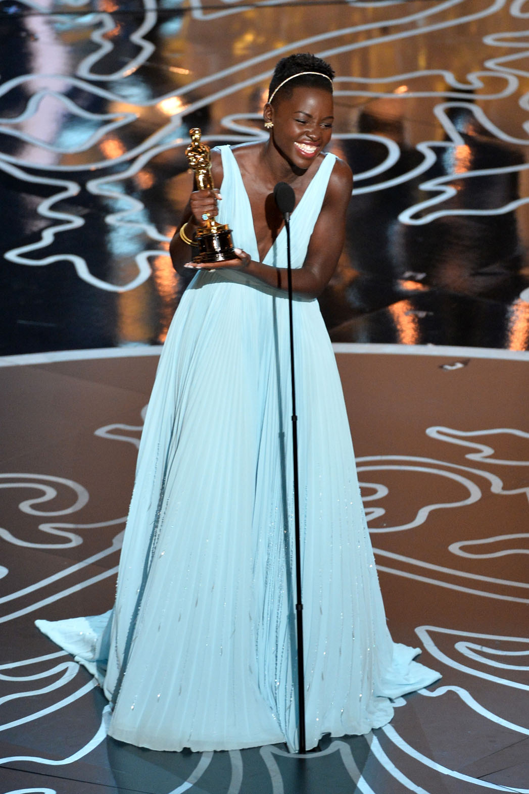 Enchanting Blue Dress: Lupita's Dress To The Oscars As She Wins