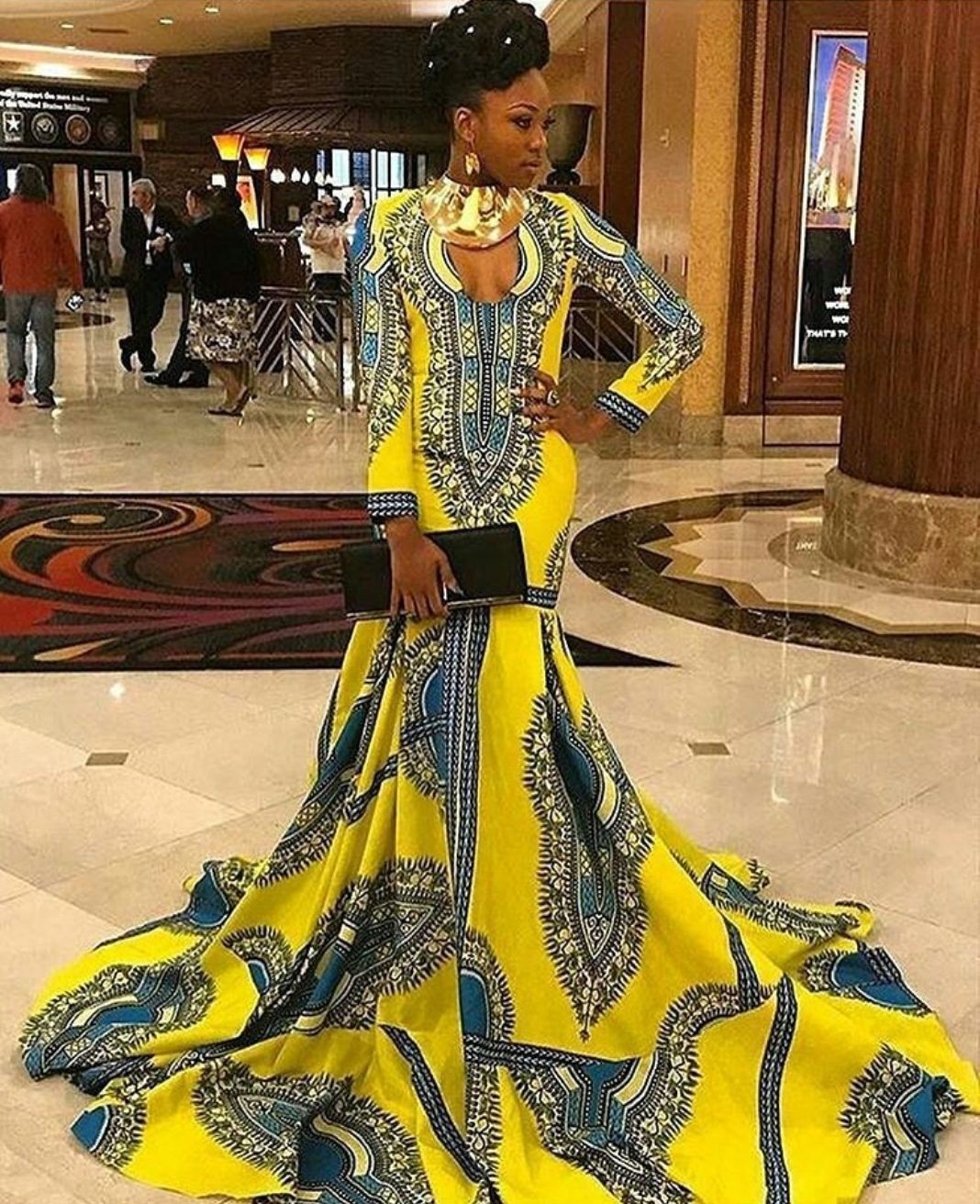 Consider a two-piece Ankara set if you're looking for something more unique. This style is perfect for those who want to show off their midriff and have a bit of fun with their prom outfit.